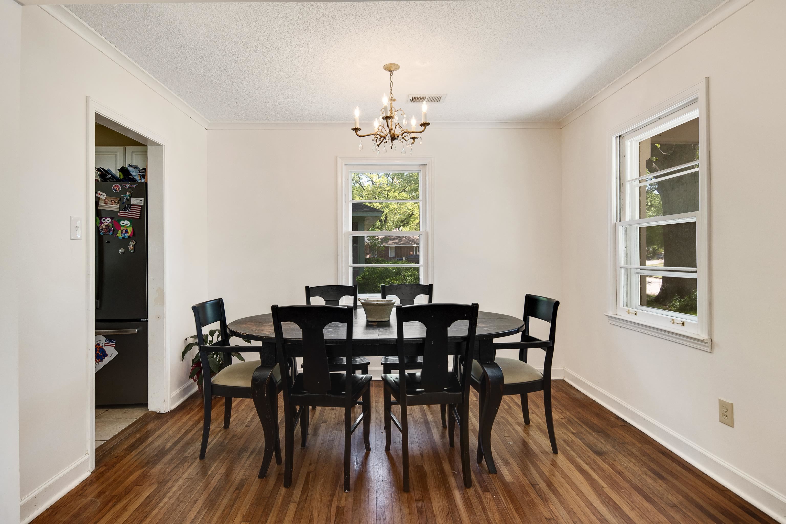 4566 Amboy Road Memphis, TN 38117 - Photo 10 of 29 a view of a dining room with furniture window and wooden floor