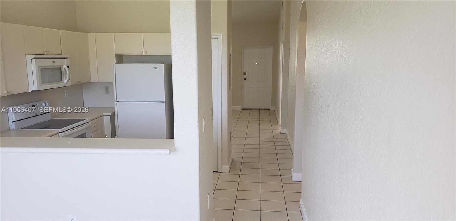 2811 Southeast 17th Avenue, Unit 202 Homestead, FL 33035 - Photo 22 of 71 a utility room with washer and dryer