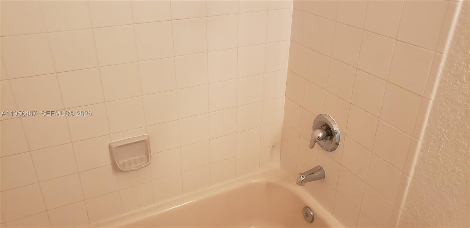 2811 Southeast 17th Avenue, Unit 202 Homestead, FL 33035 - Photo 40 of 71 a bathroom with a shower
