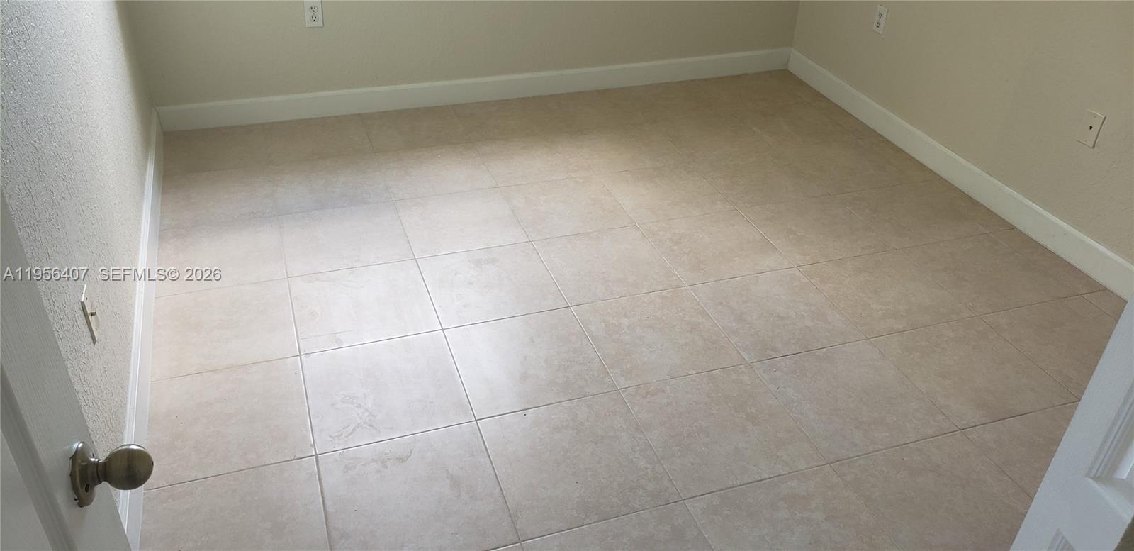 2811 Southeast 17th Avenue, Unit 202 Homestead, FL 33035 - Photo 44 of 71 a bathroom with a close shower view