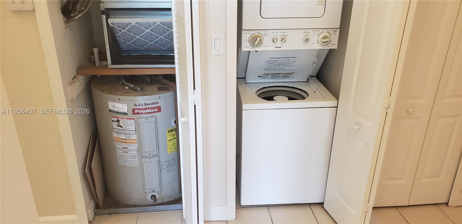 2811 Southeast 17th Avenue, Unit 202 Homestead, FL 33035 - Photo 49 of 71 a utility room with dryer and washer