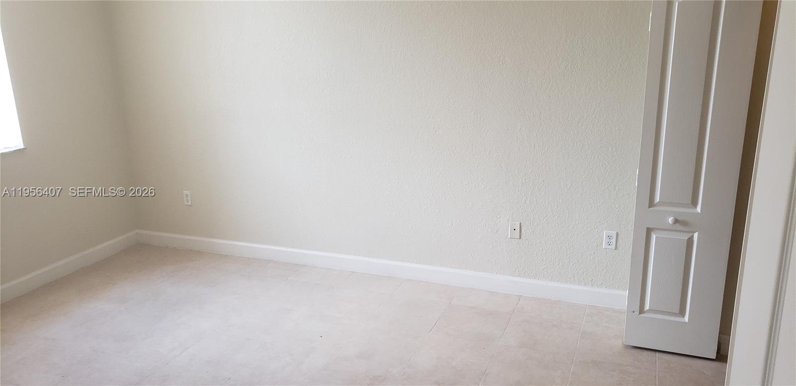 2811 Southeast 17th Avenue, Unit 202 Homestead, FL 33035 - Photo 51 of 71 a view of an empty room