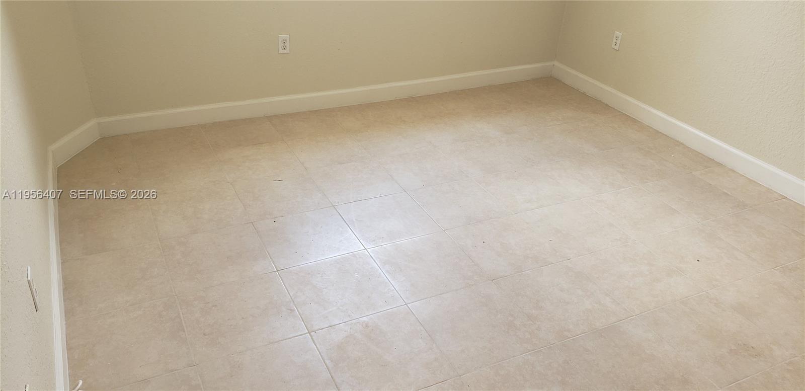 2811 Southeast 17th Avenue, Unit 202 Homestead, FL 33035 - Photo 52 of 71 a small space with a window