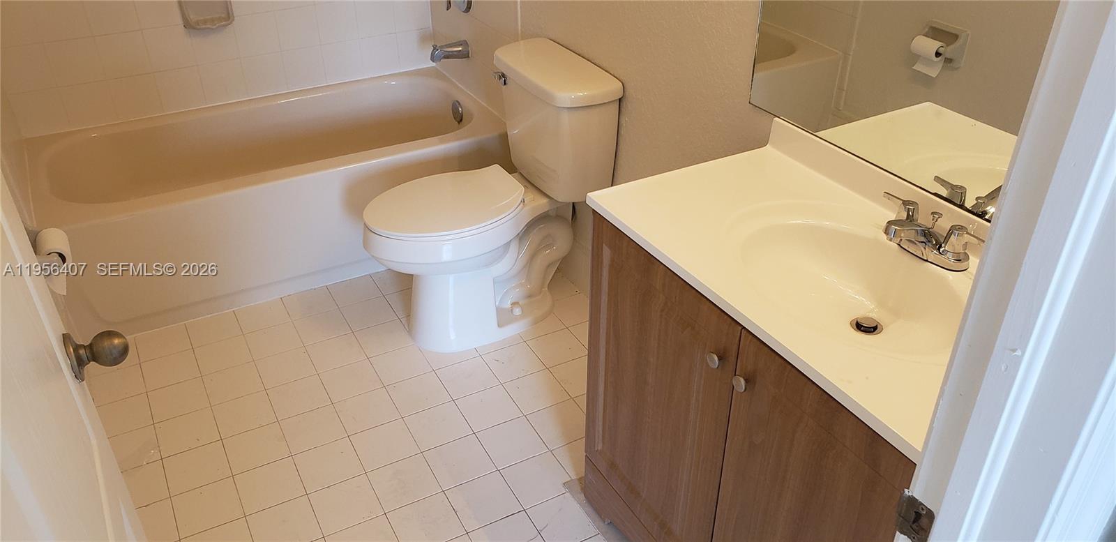 2811 Southeast 17th Avenue, Unit 202 Homestead, FL 33035 - Photo 62 of 71 a bathroom with a sink and a toilet