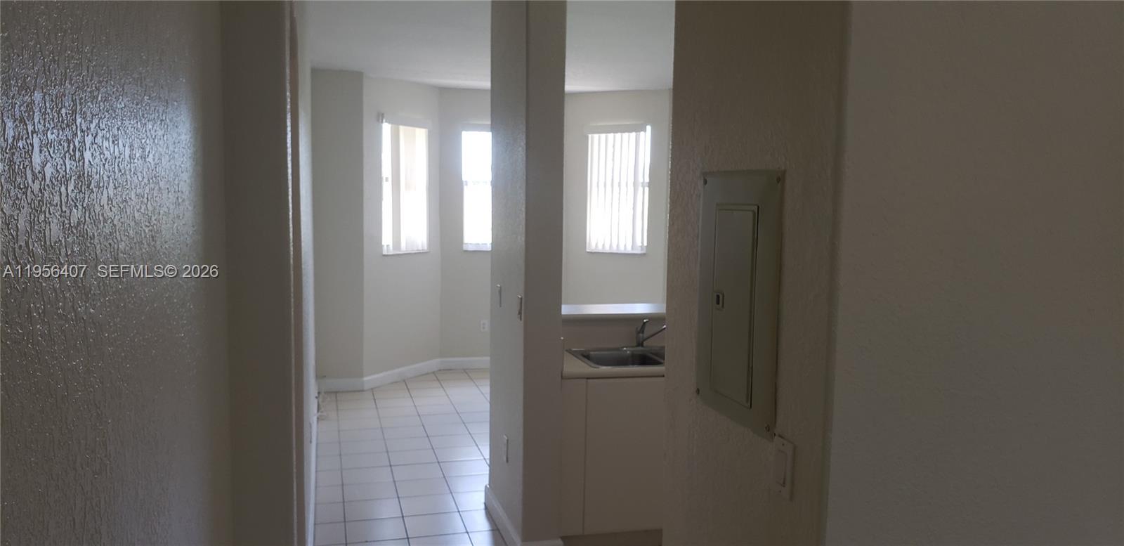 2811 Southeast 17th Avenue, Unit 202 Homestead, FL 33035 - Photo 9 of 71 a bathroom with a glass door shower
