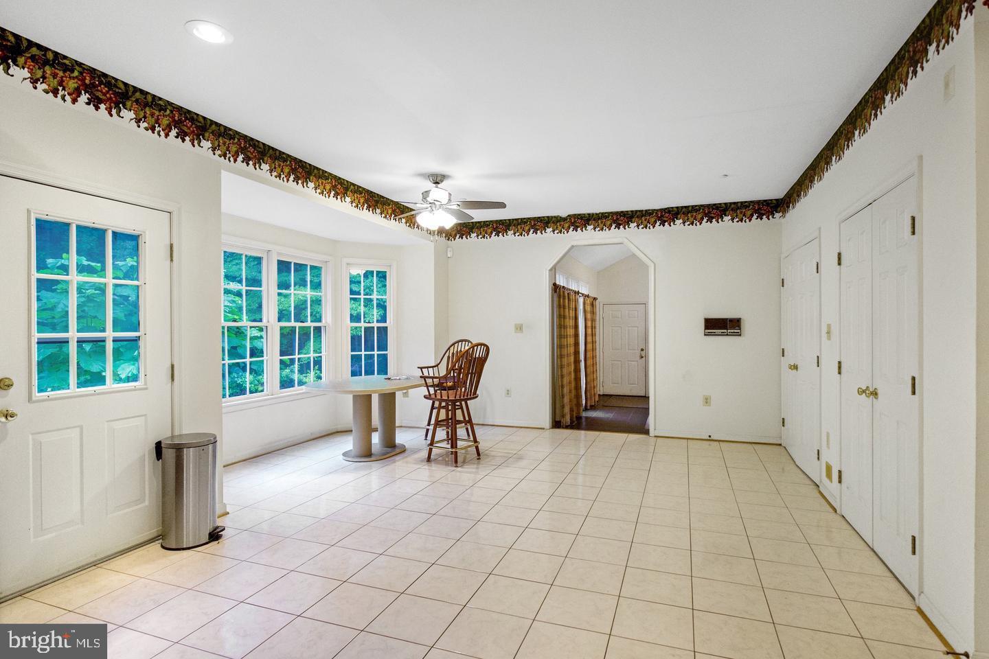 13814 West End Farm Road Upper Marlboro, MD 20772 - Photo 6 of 15 a view of an empty room with a window