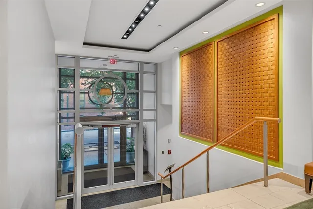 a room with a walk in closet and window