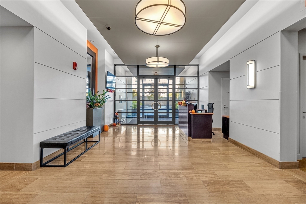 17 Otis Street, Unit 602 Cambridge, MA 02141 - Photo 4 of 40 a view of a room with window and wooden floor