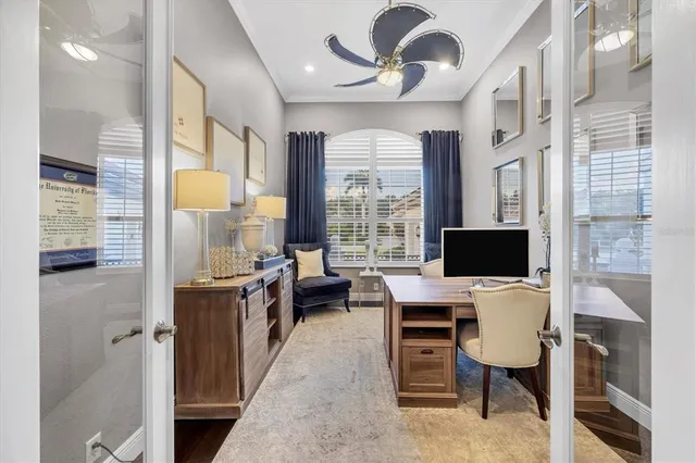 a workspace with furniture and a potted plant