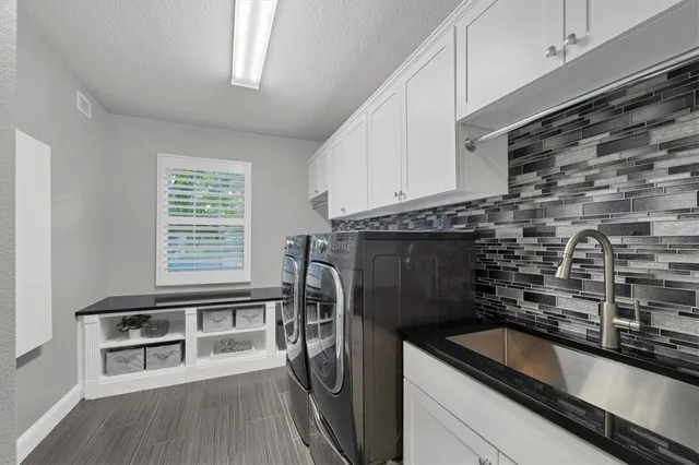 a view of a backyard with a garden and plants