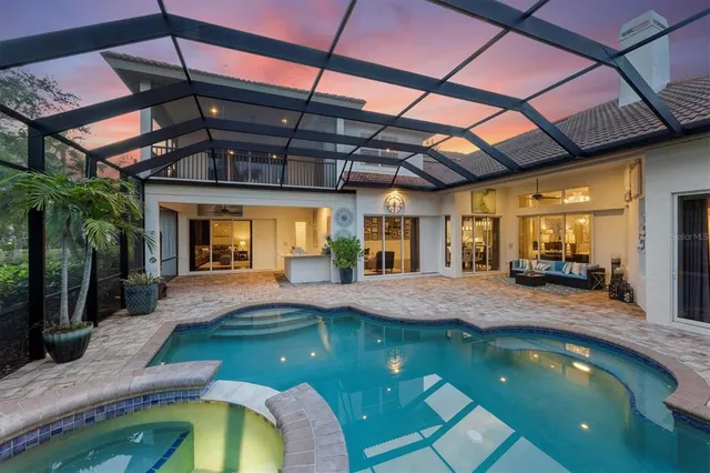 a front view of a house with fountain