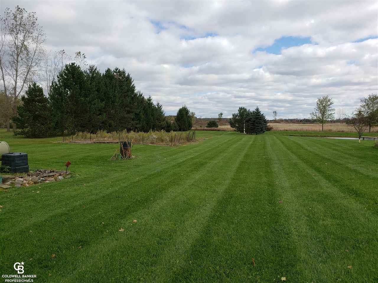 5610 Capac Road Capac, MI 48014 - Photo 7 of 28 This is a view of the back yard.