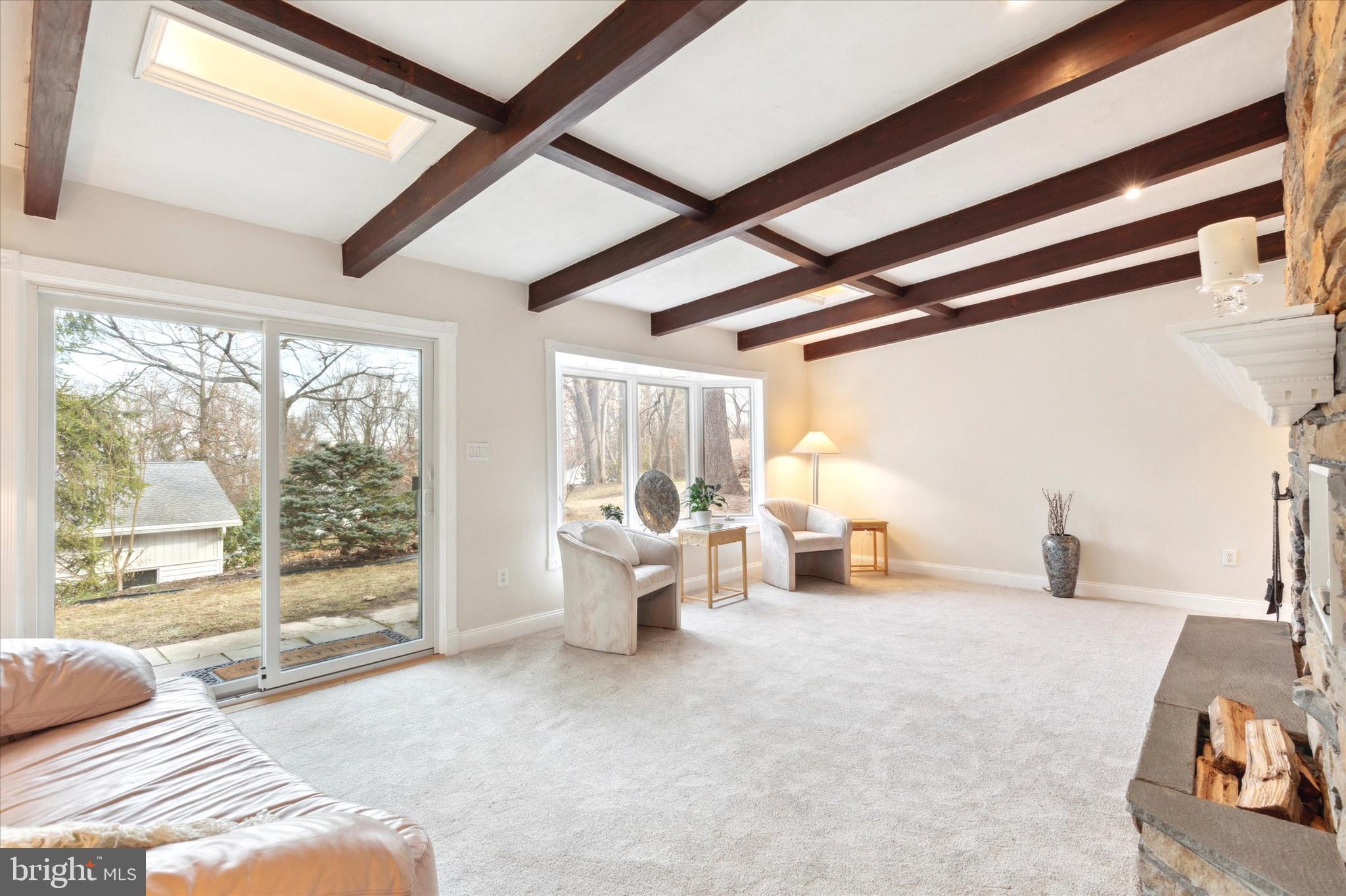 455 Sharon Drive Wayne, PA 19087 - Photo 21 of 36 Cozy and spacious
LR with new carpet and FP