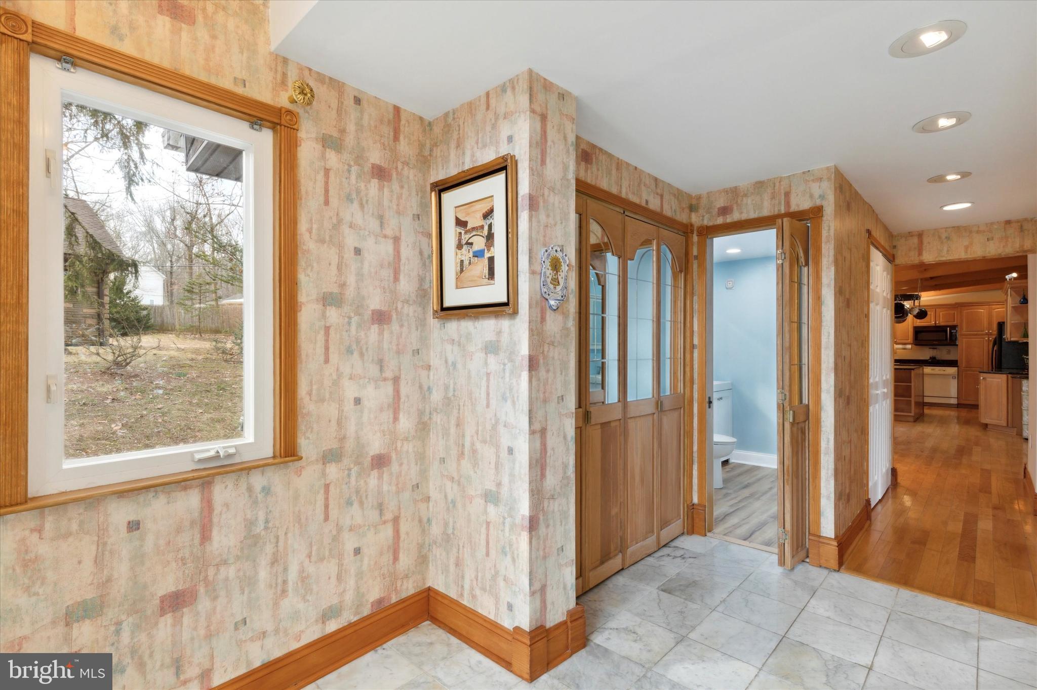 455 Sharon Drive Wayne, PA 19087 - Photo 8 of 36 Foyer w laundry access and expanded half-bath