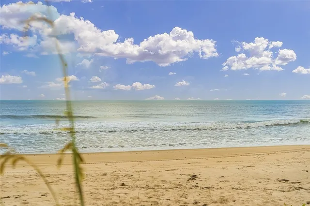 a view of beach and ocean