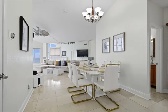 a view of a livingroom with furniture and a flat screen tv