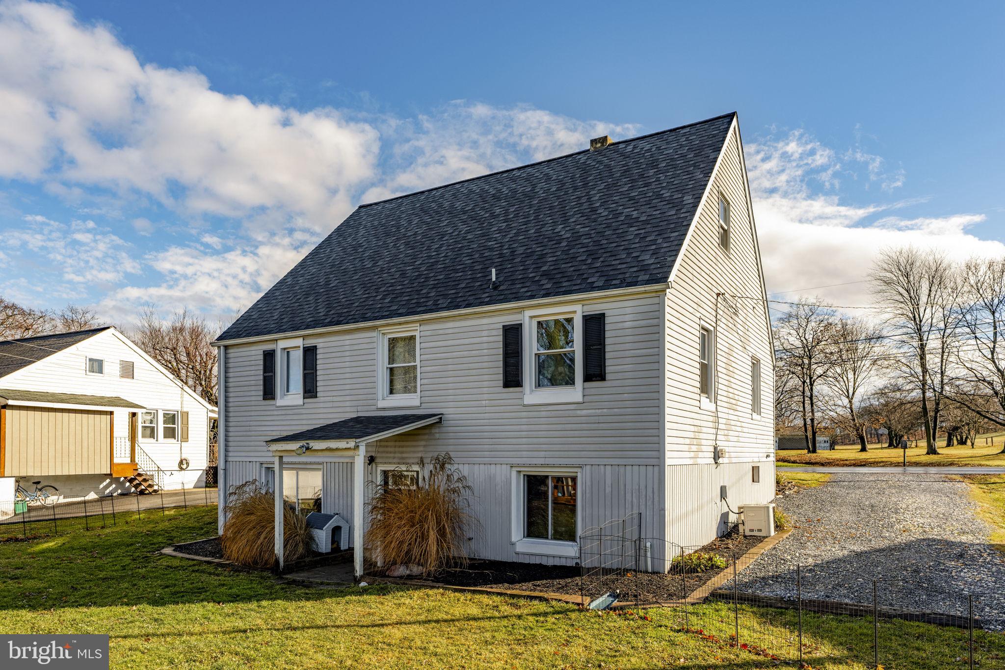 633 North Farmersville Road Ephrata, PA 17522 - Photo 12 of 54 a front view of a house with a yard