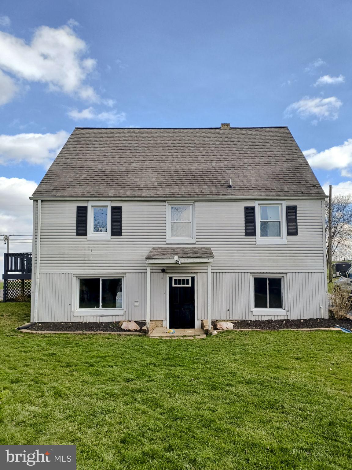 633 North Farmersville Road Ephrata, PA 17522 - Photo 14 of 54 a front view of a house with a yard