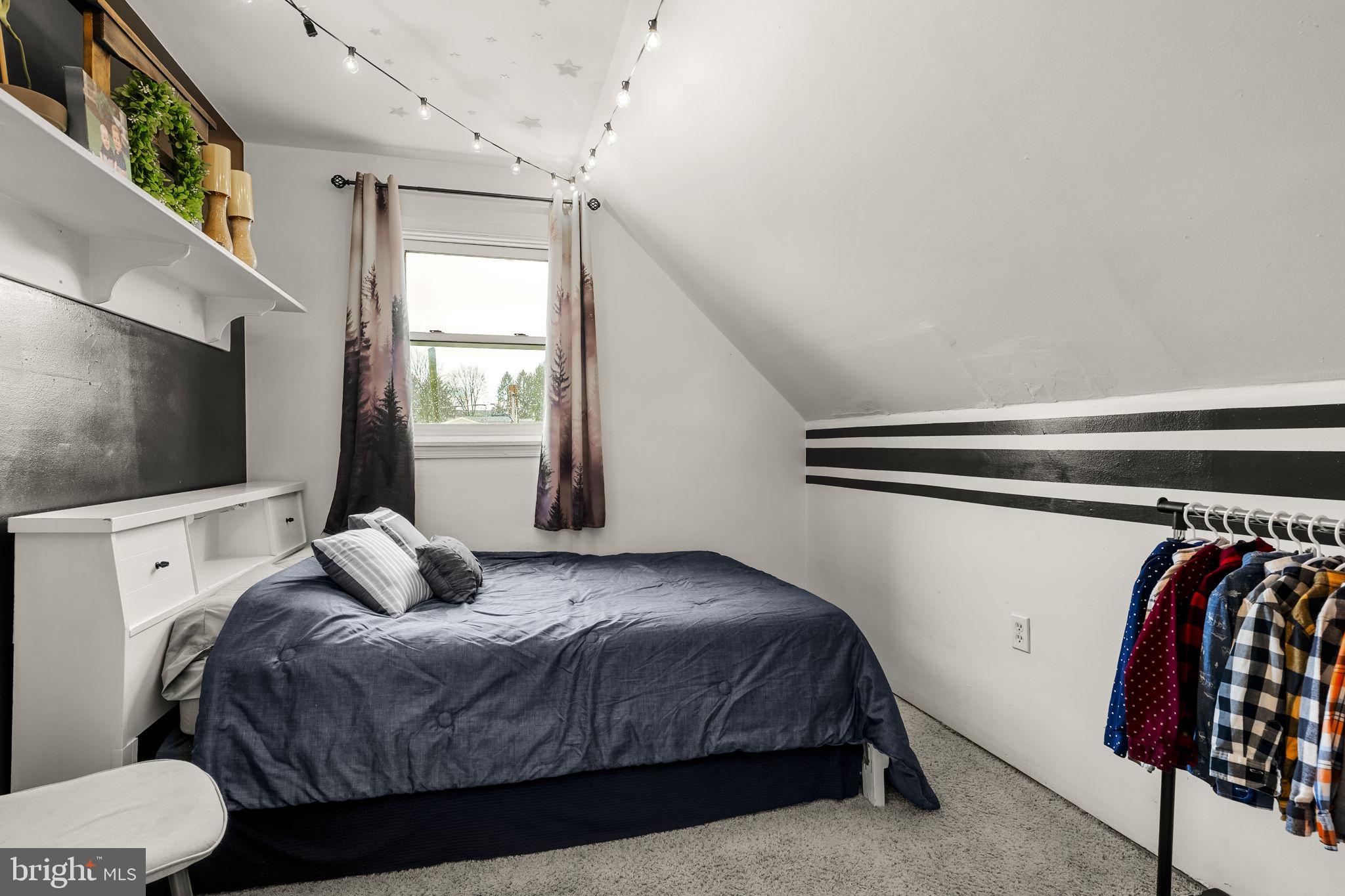 633 North Farmersville Road Ephrata, PA 17522 - Photo 42 of 54 a bedroom with a two bed and a flat screen tv