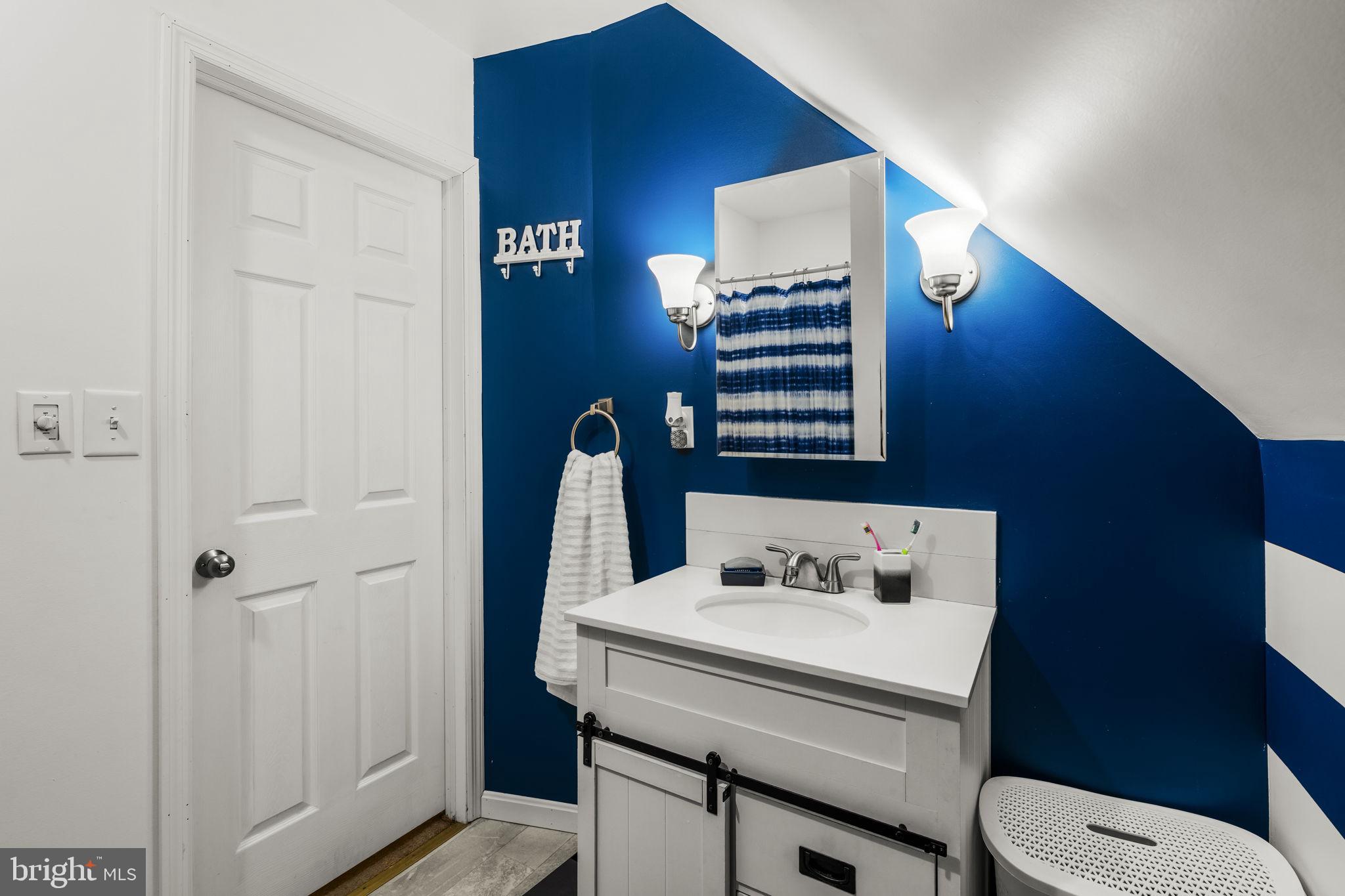 633 North Farmersville Road Ephrata, PA 17522 - Photo 47 of 54 a bathroom with a sink a toilet and shower