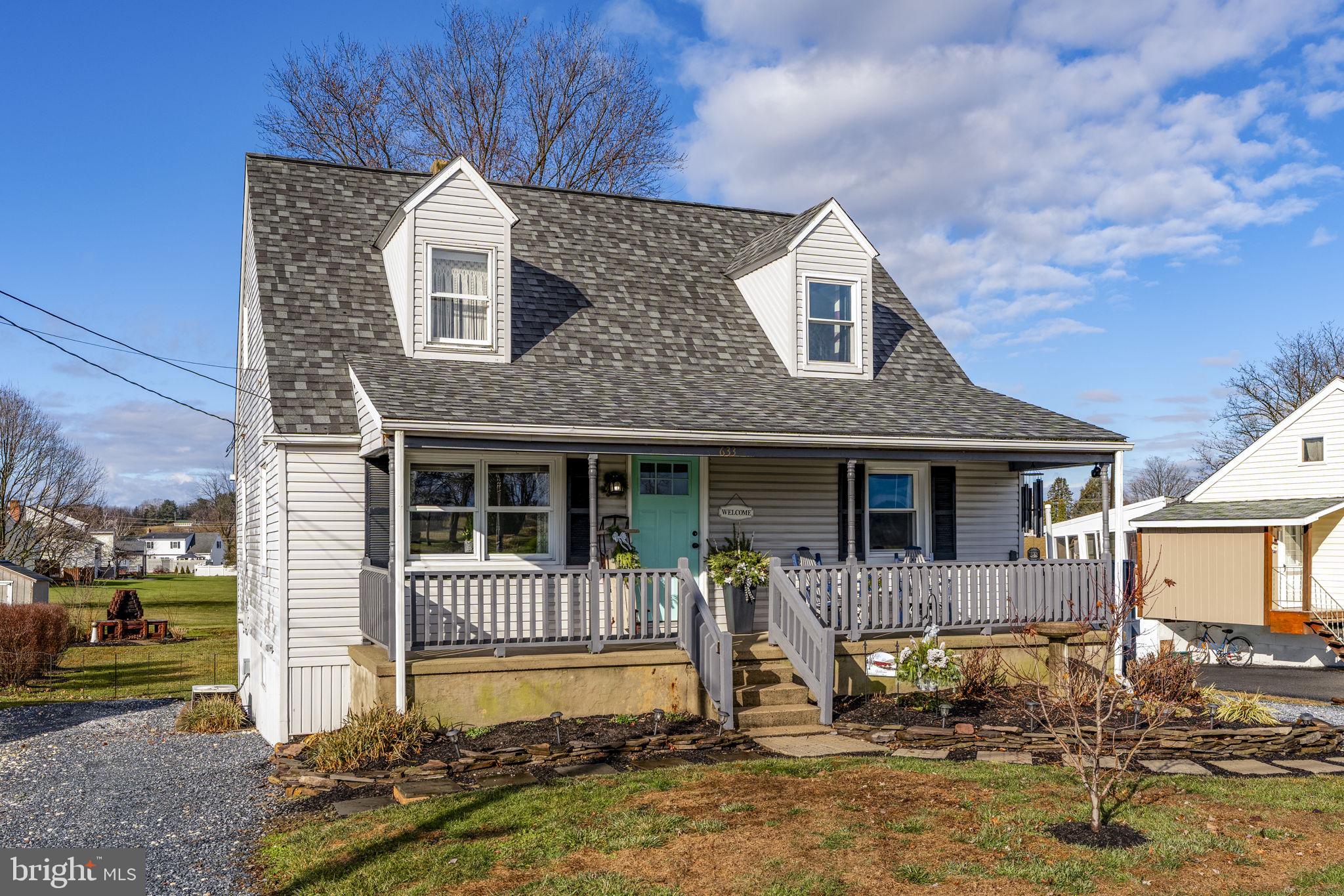 633 North Farmersville Road Ephrata, PA 17522 - Photo 8 of 54 a front view of a house with garden
