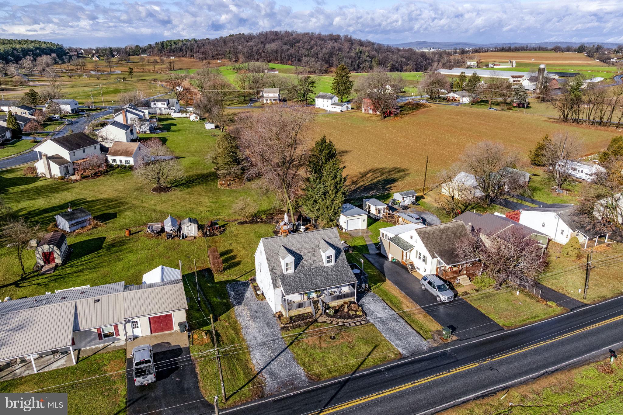 633 North Farmersville Road Ephrata, PA 17522 - Photo 9 of 54 an aerial view of residential houses with outdoor space