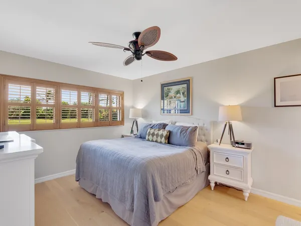 a bathroom with a sink vanity and a mirror