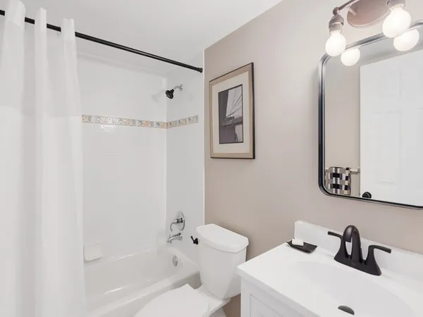 a building with potted plants in front of it