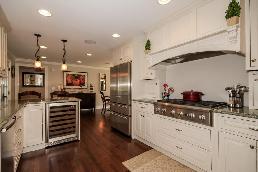 9 Field Crest Road New Canaan, CT 06840 - Photo 5 of 25 a kitchen with stainless steel appliances kitchen island granite countertop a stove and a refrigerator