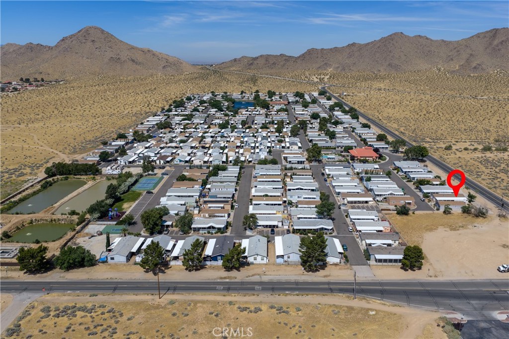 20843 Waalew Road, Unit C125 Apple Valley, CA 92307 - Photo 28 of 38 an aerial view of multiple house