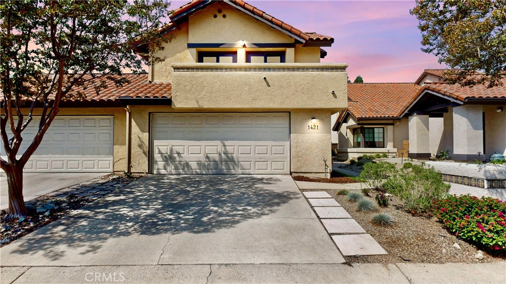 1421 Rust Court Claremont, CA 91711 - Photo 2 of 47 a front view of a house with a yard