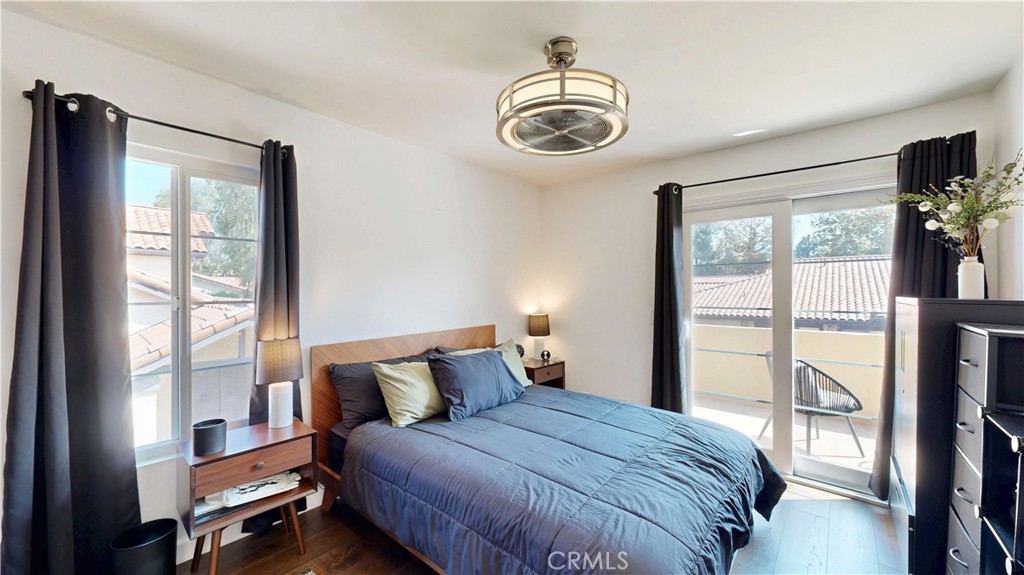 1421 Rust Court Claremont, CA 91711 - Photo 31 of 47 a bedroom with a large bed and a large window