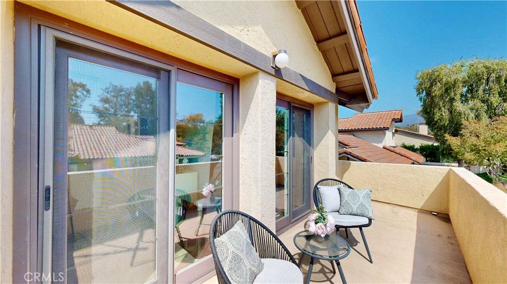 1421 Rust Court Claremont, CA 91711 - Photo 37 of 47 a balcony view with a sink and glass door