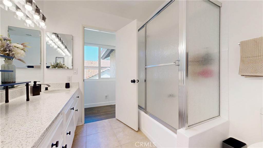 1421 Rust Court Claremont, CA 91711 - Photo 39 of 47 a bathroom with a double vanity sink and mirror