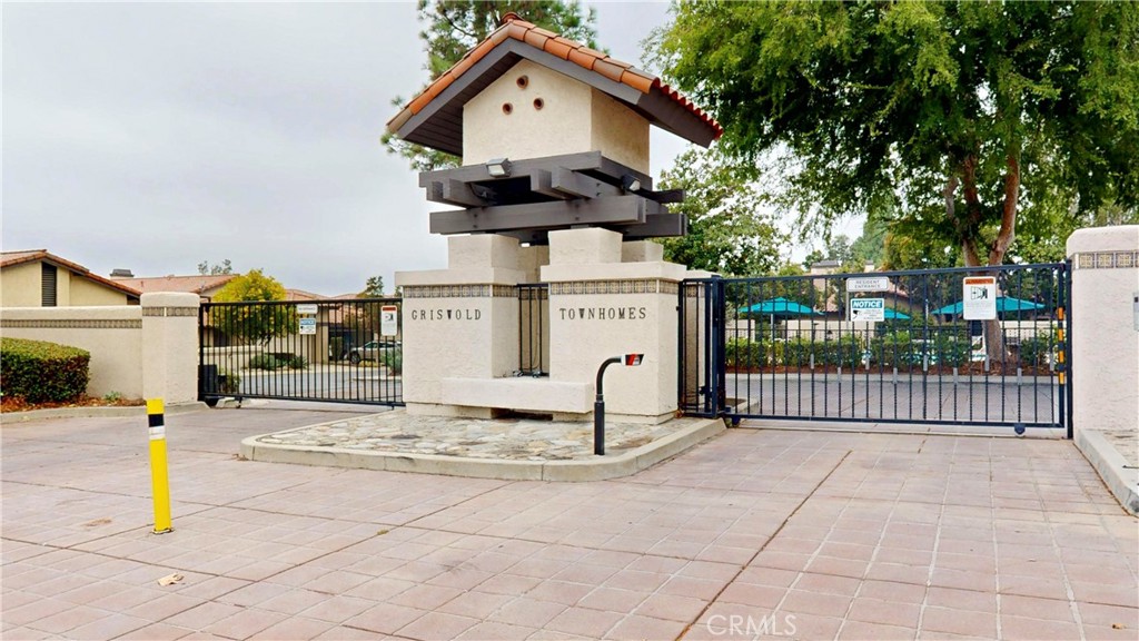 1421 Rust Court Claremont, CA 91711 - Photo 43 of 47 a view of a brick house with large trees and playing area