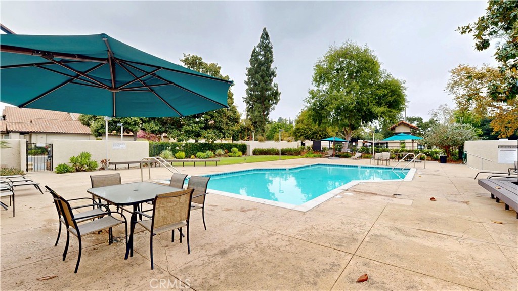 1421 Rust Court Claremont, CA 91711 - Photo 44 of 47 a view of a swimming pool with a patio