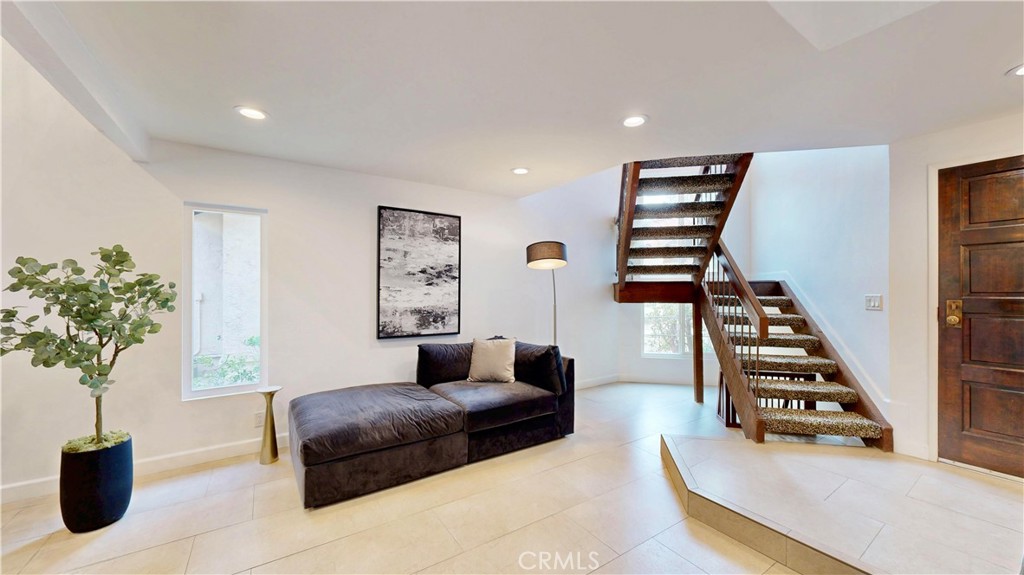 1421 Rust Court Claremont, CA 91711 - Photo 5 of 47 a bedroom with furniture and a potted plant