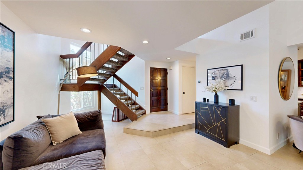 1421 Rust Court Claremont, CA 91711 - Photo 6 of 47 a living room with furniture and stairs