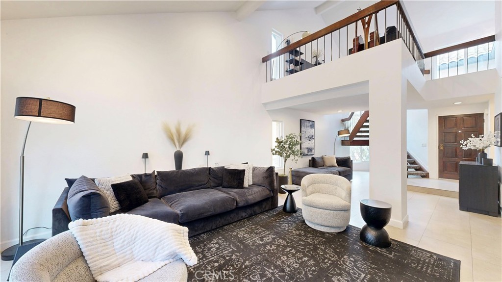 1421 Rust Court Claremont, CA 91711 - Photo 8 of 47 a living room with furniture a rug and white walls