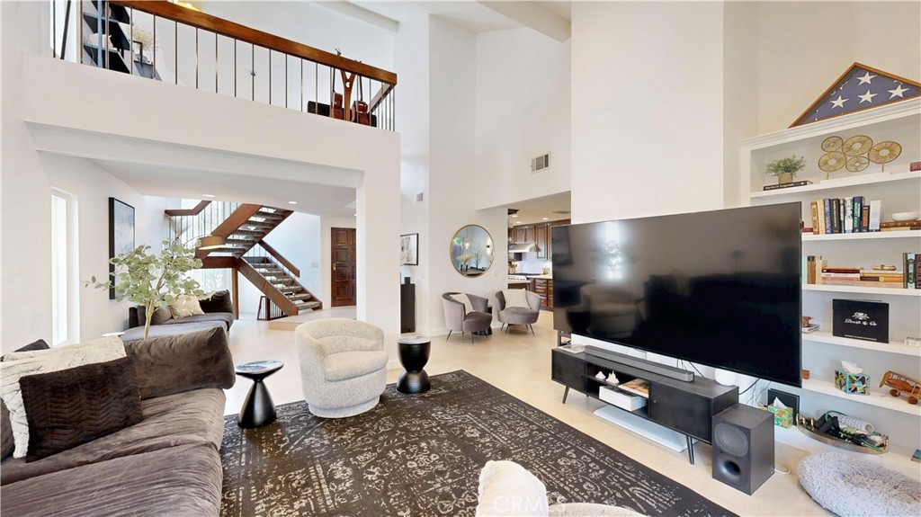 1421 Rust Court Claremont, CA 91711 - Photo 10 of 47 a living room with furniture and a flat screen tv