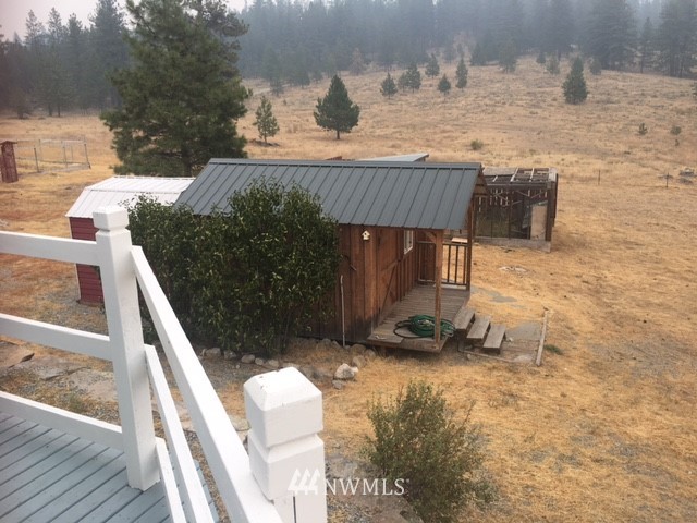 94 Main Road Tonasket, WA 98855 - Photo 20 of 25 a terrace of a house with outdoor seating