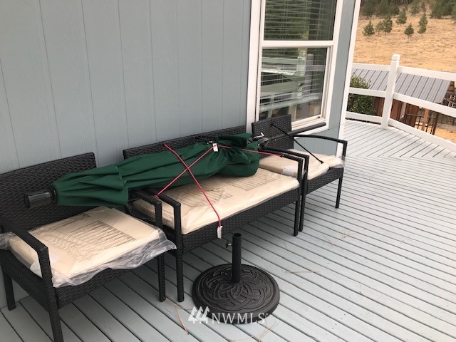 94 Main Road Tonasket, WA 98855 - Photo 22 of 25 a view of a outdoor seating area with furniture