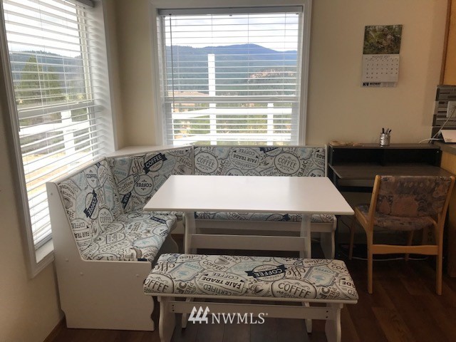 94 Main Road Tonasket, WA 98855 - Photo 10 of 25 a living room with furniture and a window