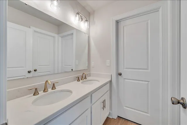 a bathroom with a sink a toilet and a bathtub