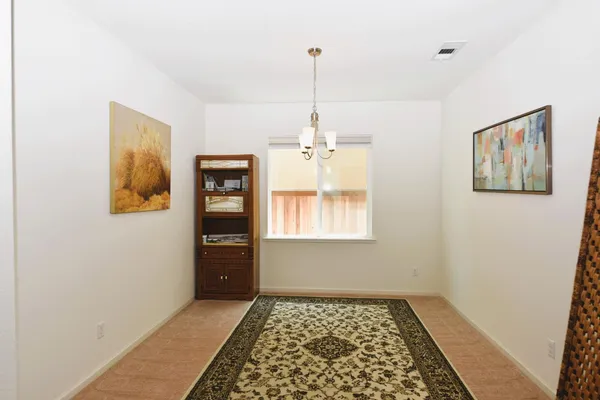 a bed room with a bed and a window