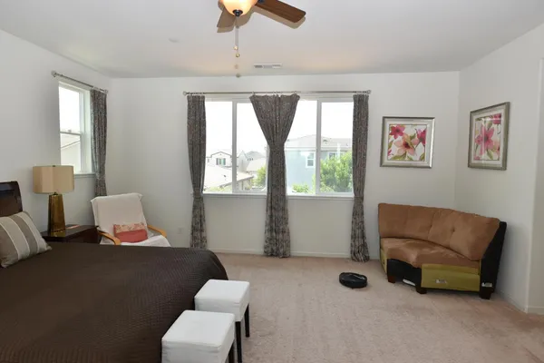 a spacious bathroom with a double vanity sink double and mirror