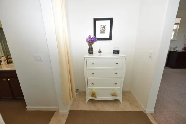 a view of a hallway with closet
