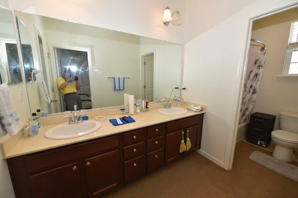 a view of a hallway with staircase