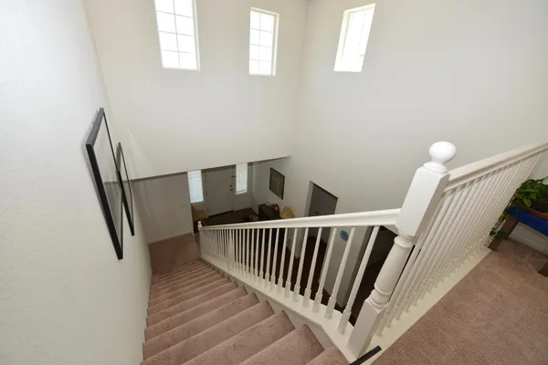 a view of a house with a tree