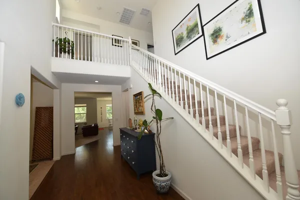 a view of entryway with wooden floor